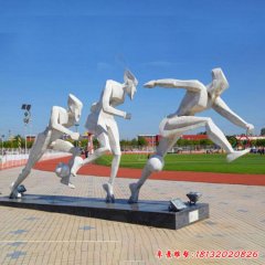 校园不锈钢抽象踢足球人物雕塑